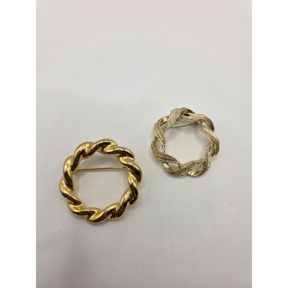 1743. Set of Two Gold Tone Circle Brooch / Pins